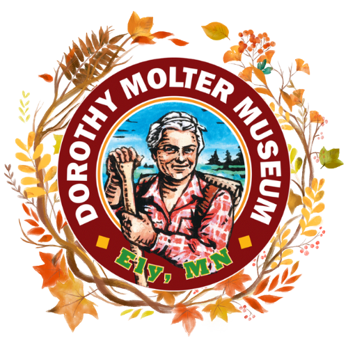 Dorothy Molter Museum logo with a leaf wreath around it